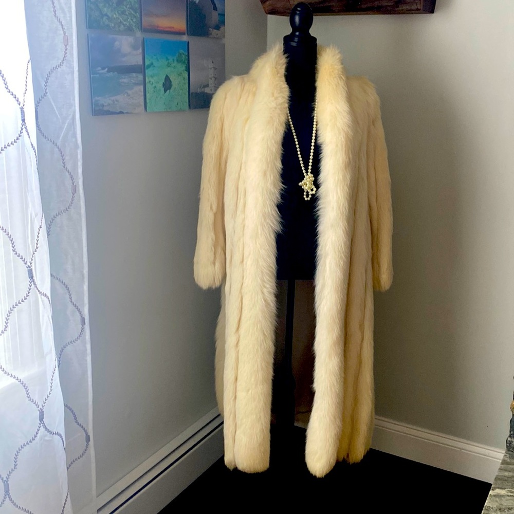 Vintage from the 1980’s, full size, fox fur coat in excellent condition.